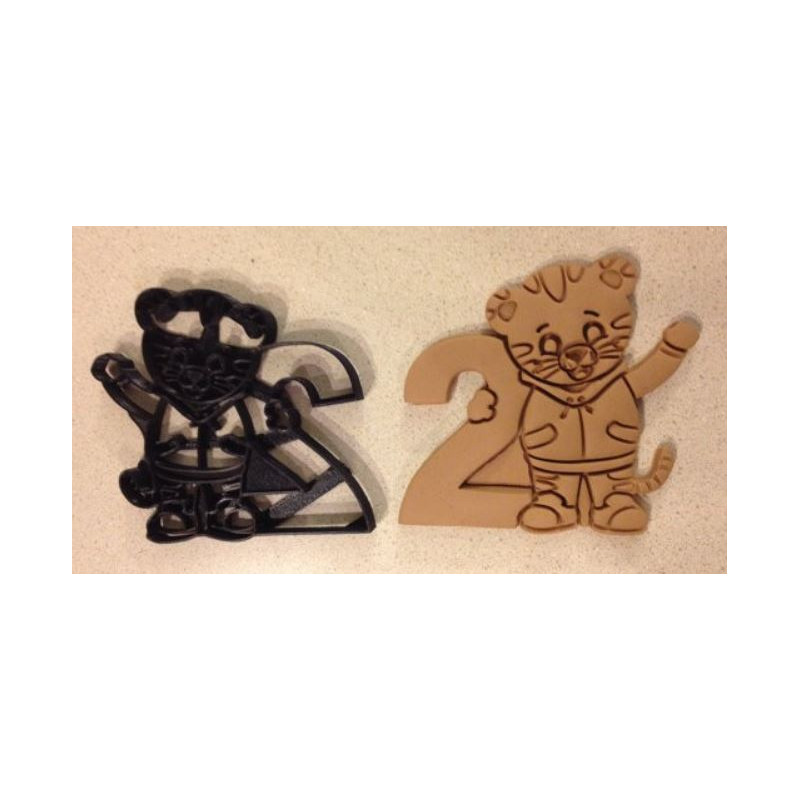 Daniel Tiger Cookie Cutter holding the number 2. Perfect for your kid's 2nd year birthday party!